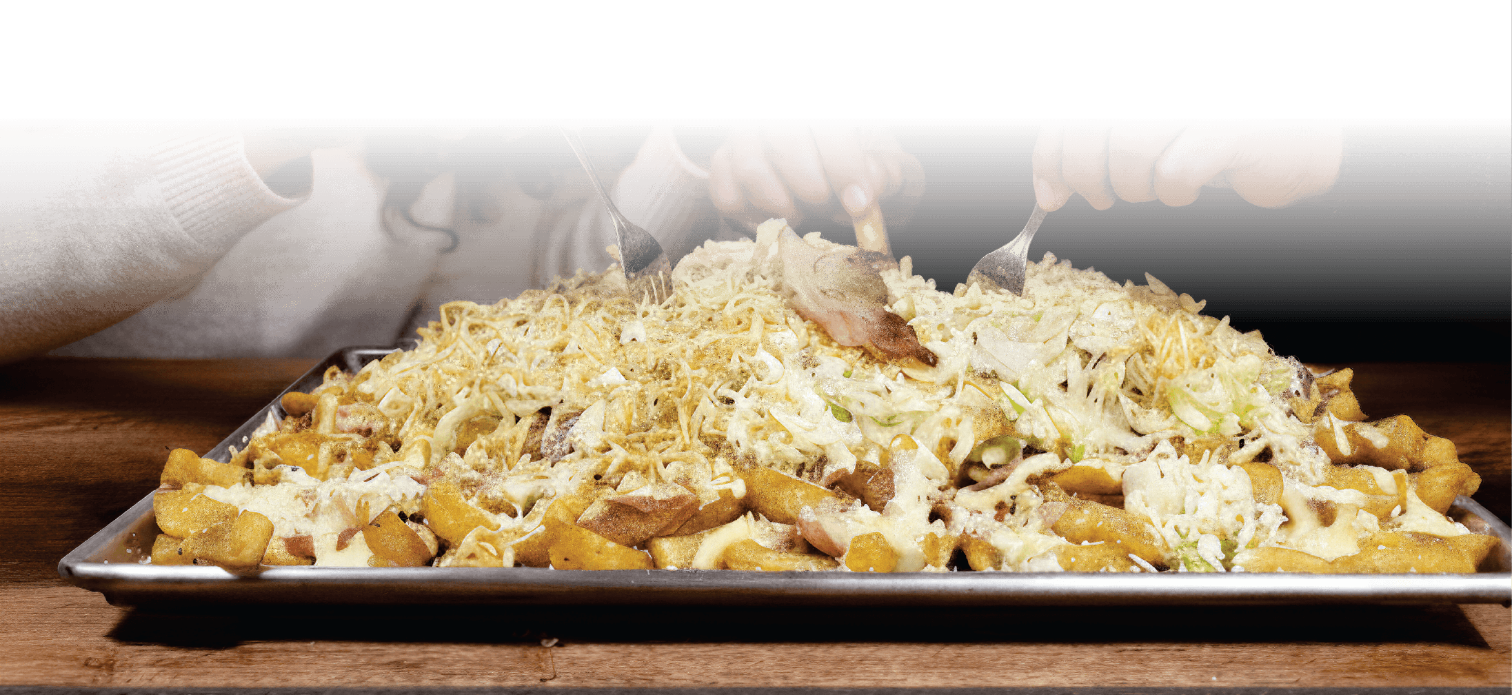 salchipapa costeña en Bogotá